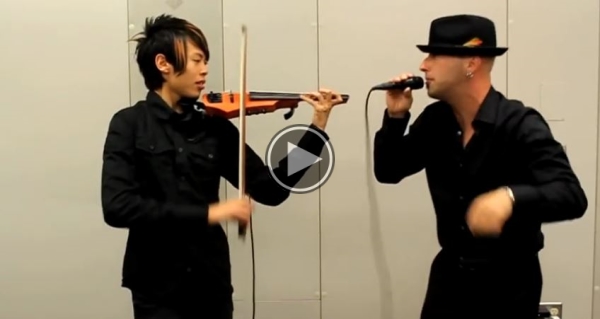 One Guy Is Playing The Violin, But What The Other Guy Is Doing Will Blow Your Mind.